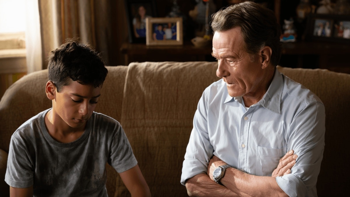 Frankie Muniz with back to camera, Jane Kaczmarek and Bryan Cranston in Malcolm in the Middle: Life’s Still Unfair