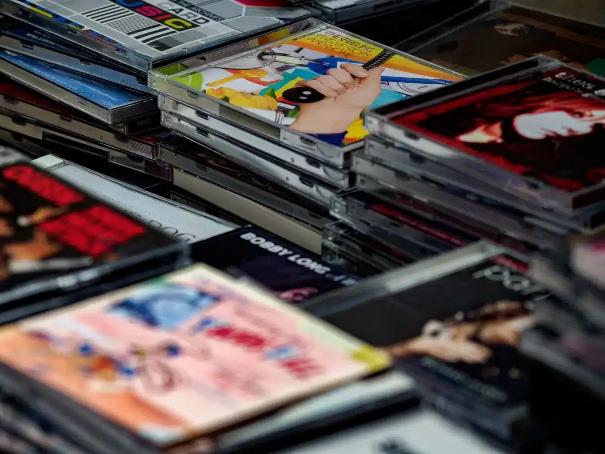 Digital streaming interface displaying music catalog and vinyl collection imagery