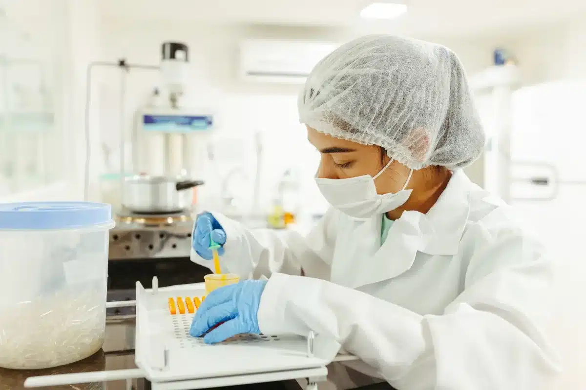 Medical researchers conducting experiments with patients in a clinical trial laboratory