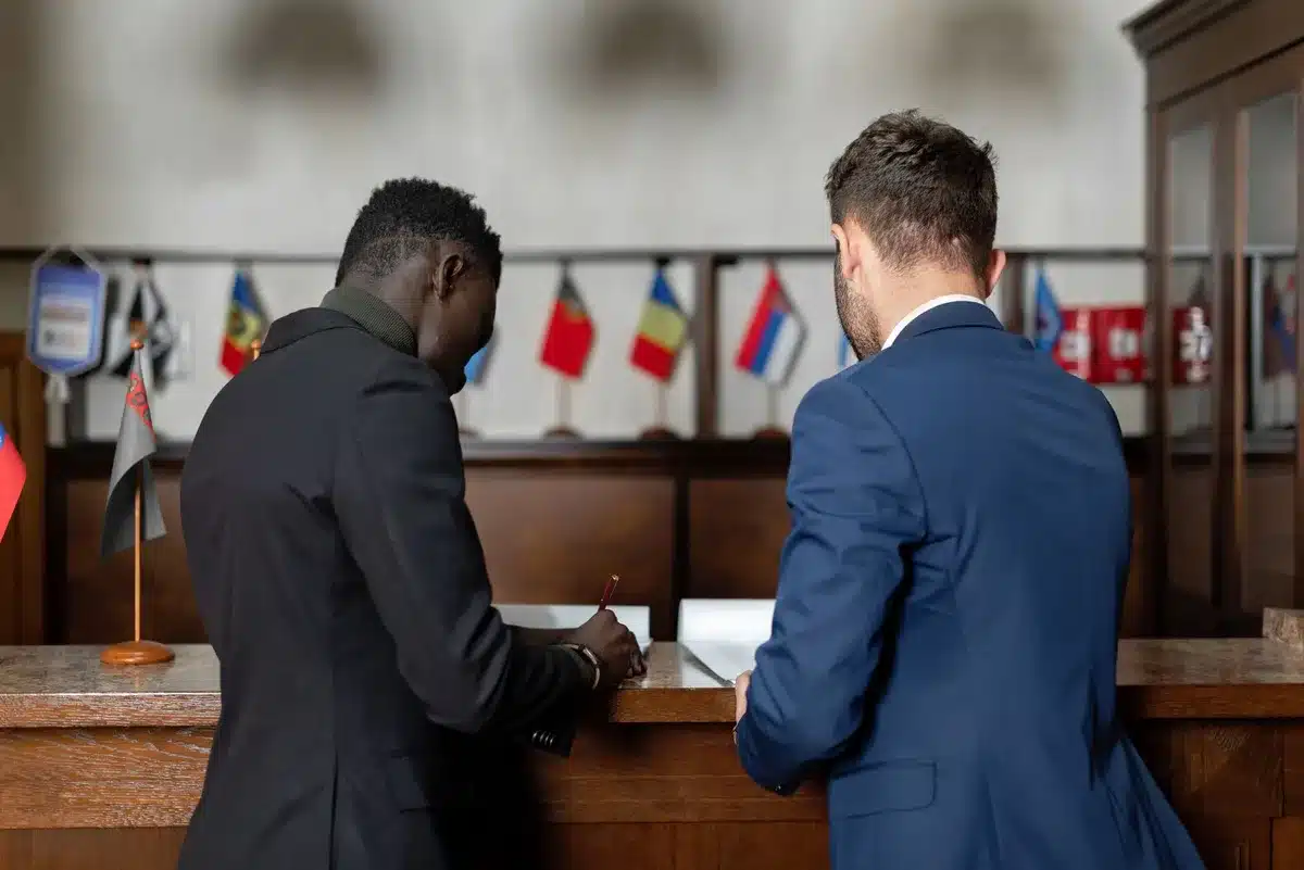 Journalist verifying facts and official statements at a desk with documents and computer