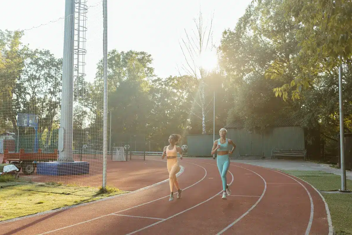 Person sprinting on a track during high-intensity interval training