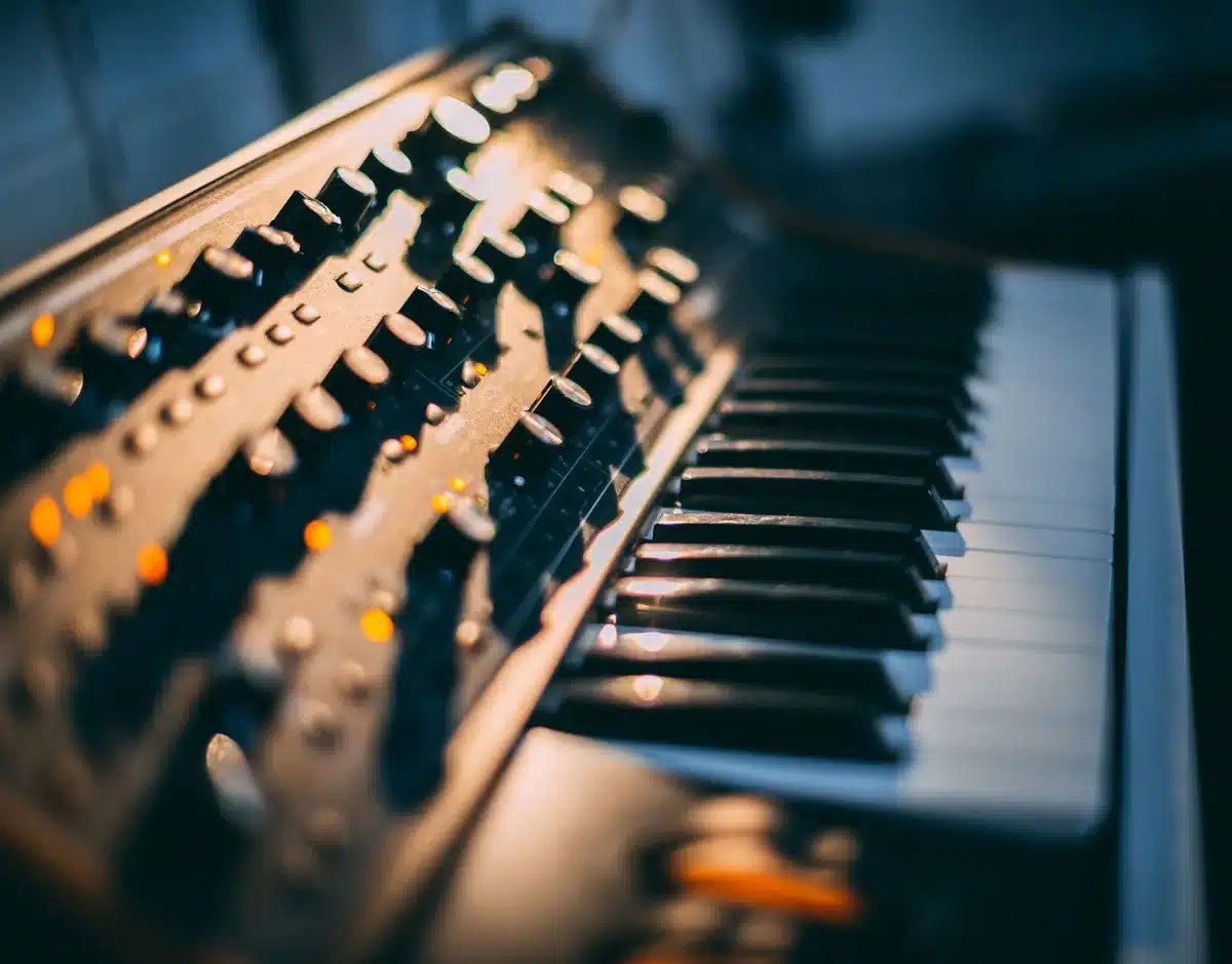 Close-up of piano keys being played during a music recording session