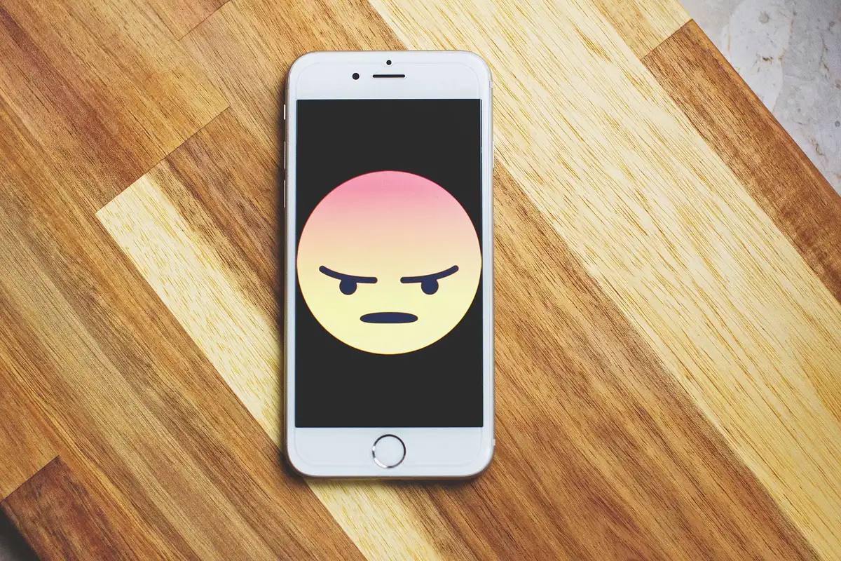 Social media feed showing mixed fan reactions with messages of disappointment and supportive comments.