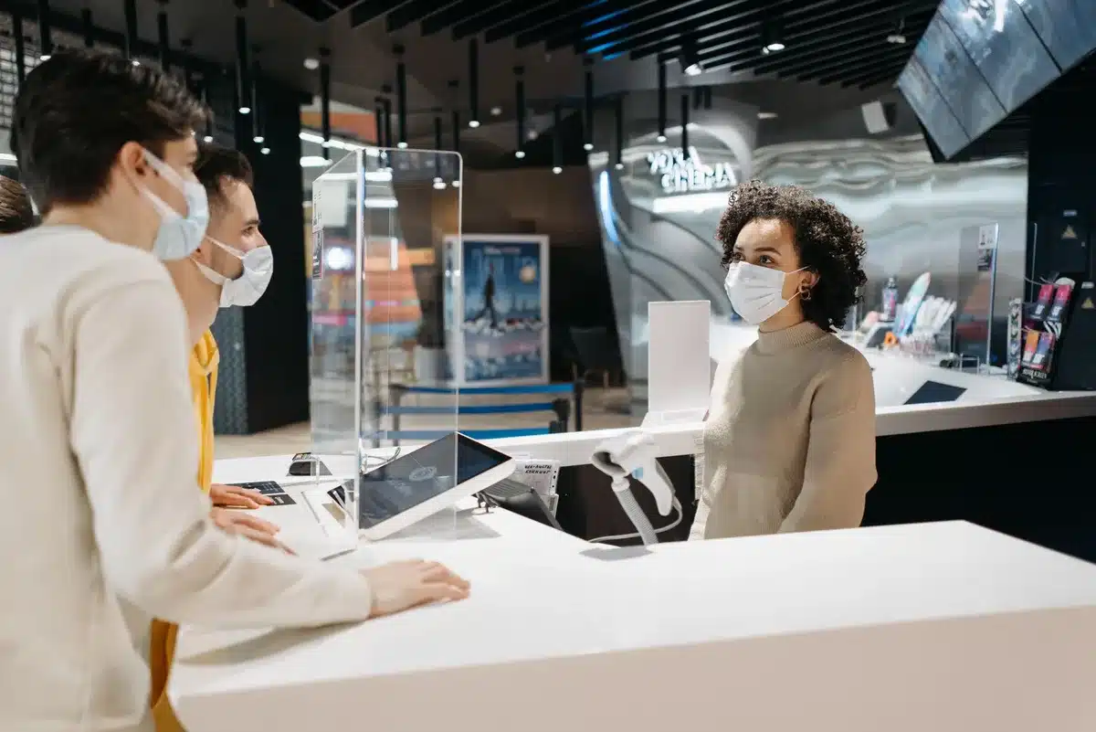 Person reviewing ticket purchase information and refund options on a computer screen.