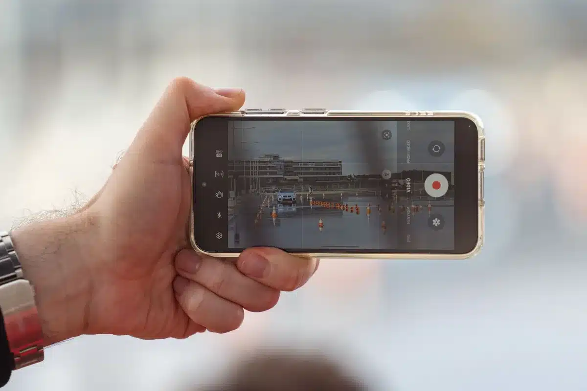 Smartphone screen showing AI-powered photo capture interface with motion detection