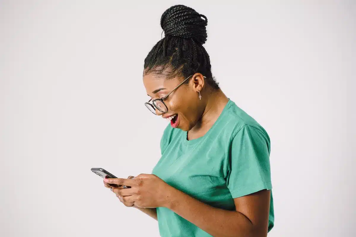 Smartphone screen showing social media feed with music discussion and comments