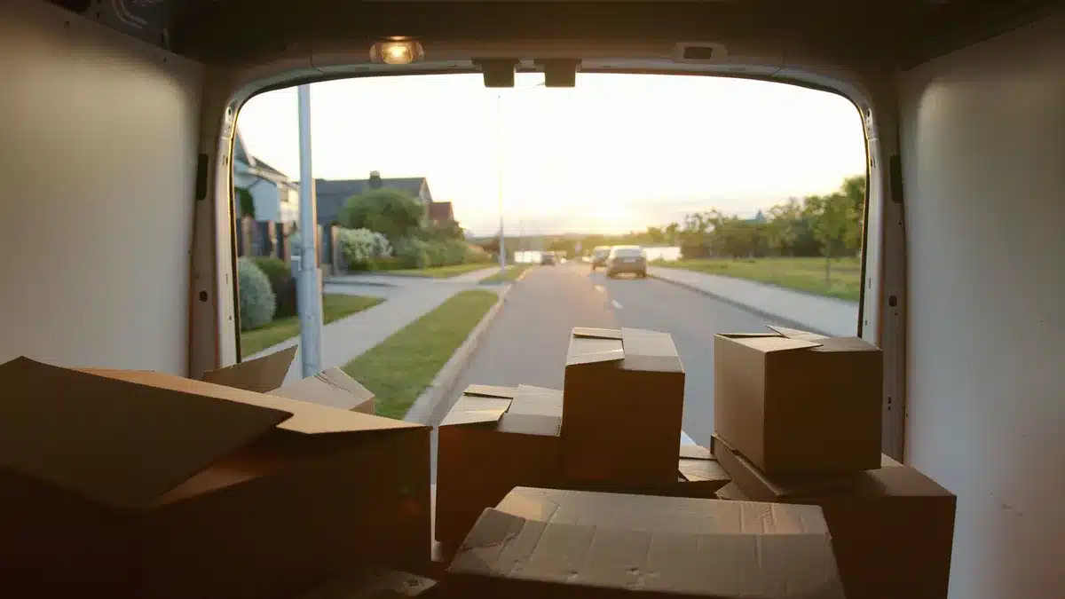 Claustrophobic interior of a camper van with unsettling objects and confined space