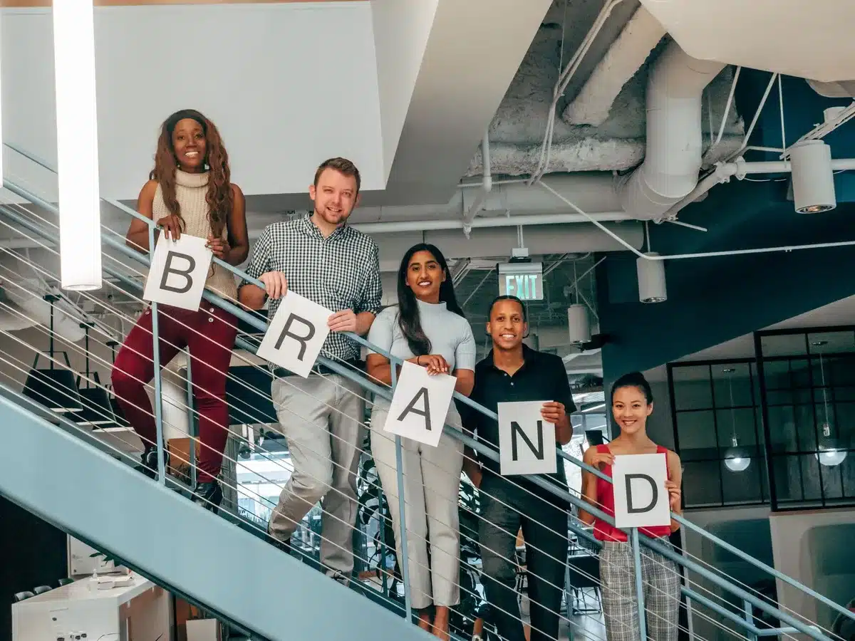 Multiple creators of different backgrounds collaborating on a marketing project together.