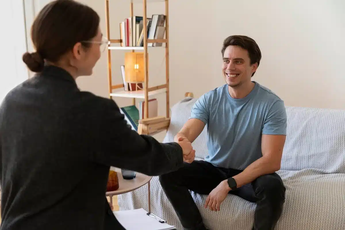 Therapist or counselor in a supportive professional setting, symbolizing mental health care and recovery guidance.