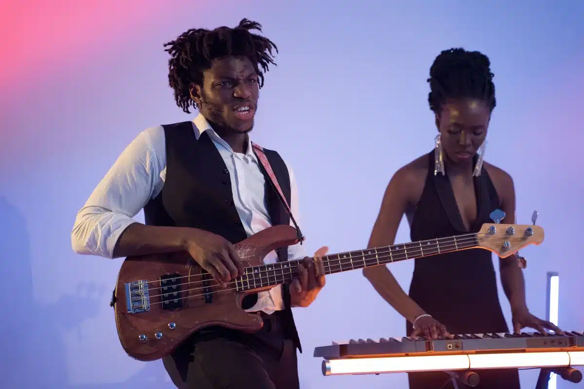 Musicians performing together on stage during a rock concert
