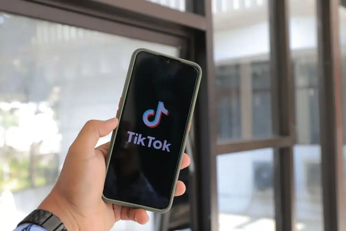 Social media posts and comments discussing the anonymous donation on platforms like TikTok and X