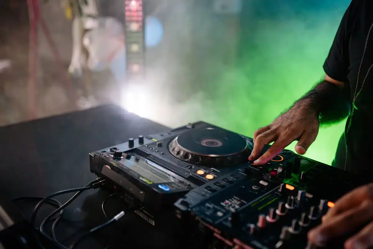 DJ equipment and turntables on a concert stage during a live performance