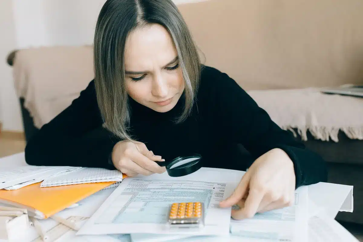 Journalist reviewing documents and data for fact-checking verification process