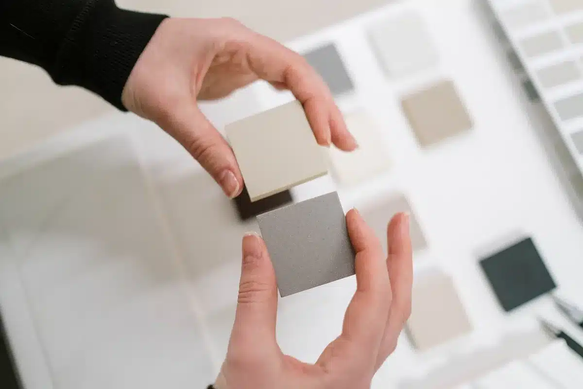 Side-by-side comparison of office interior styles showing color and furniture changes