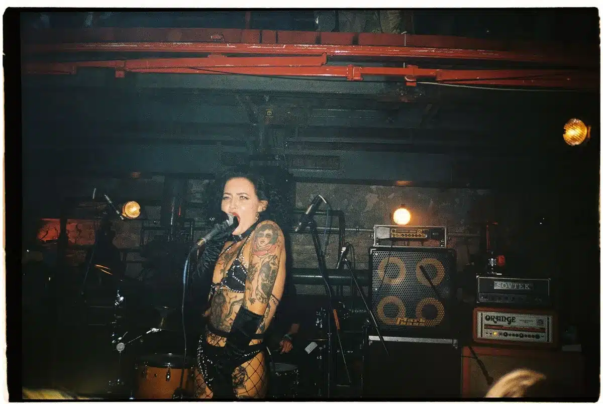 Hardcore band performing with intense energy on stage