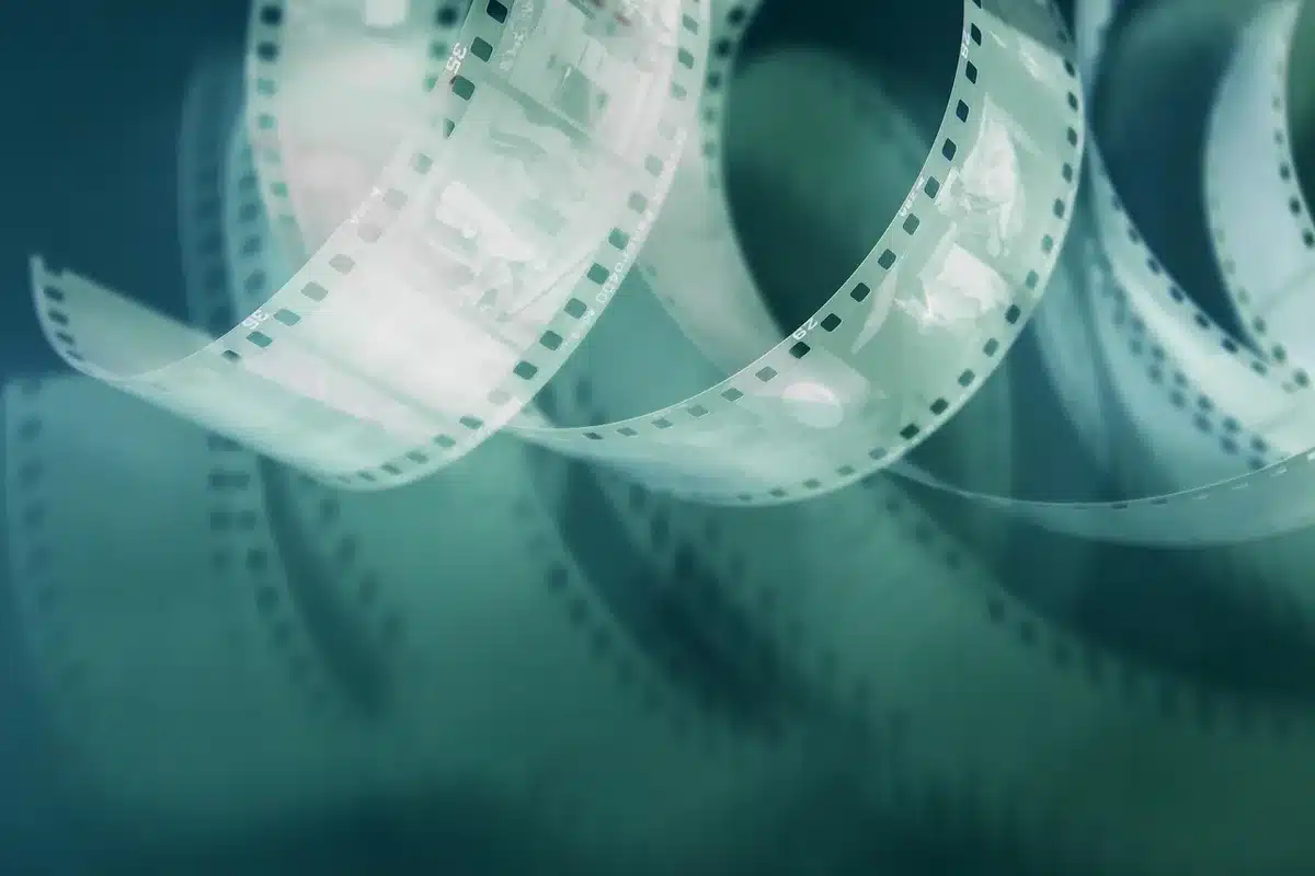Smartphone showing a playlist with retro hits used in film soundtracks