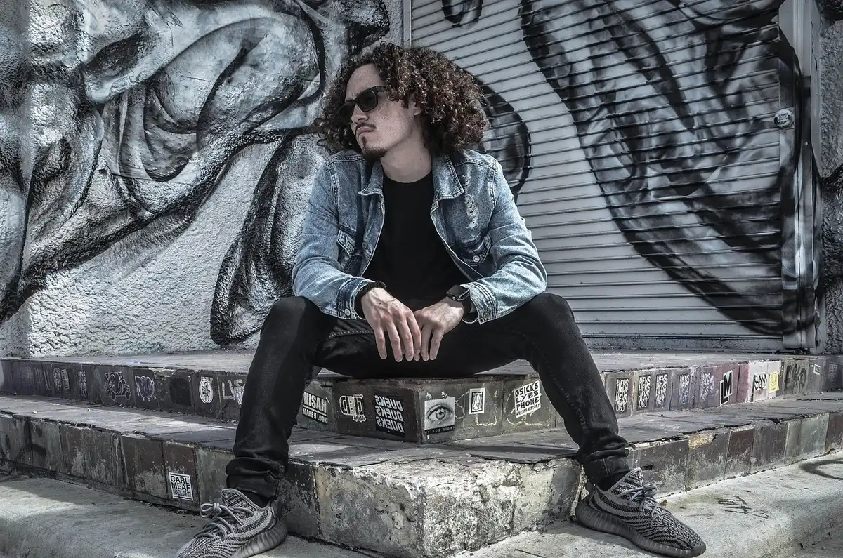 Gen Z listener with phone and retro aesthetic, discovering old music
