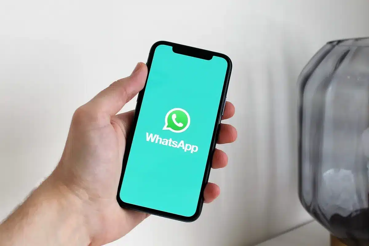 Smartphones recording fans reacting and sharing clips at a festival