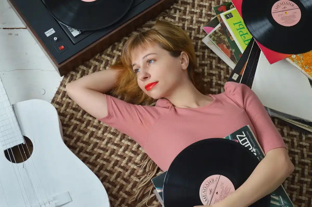 A cozy living room with a record player and warm lighting