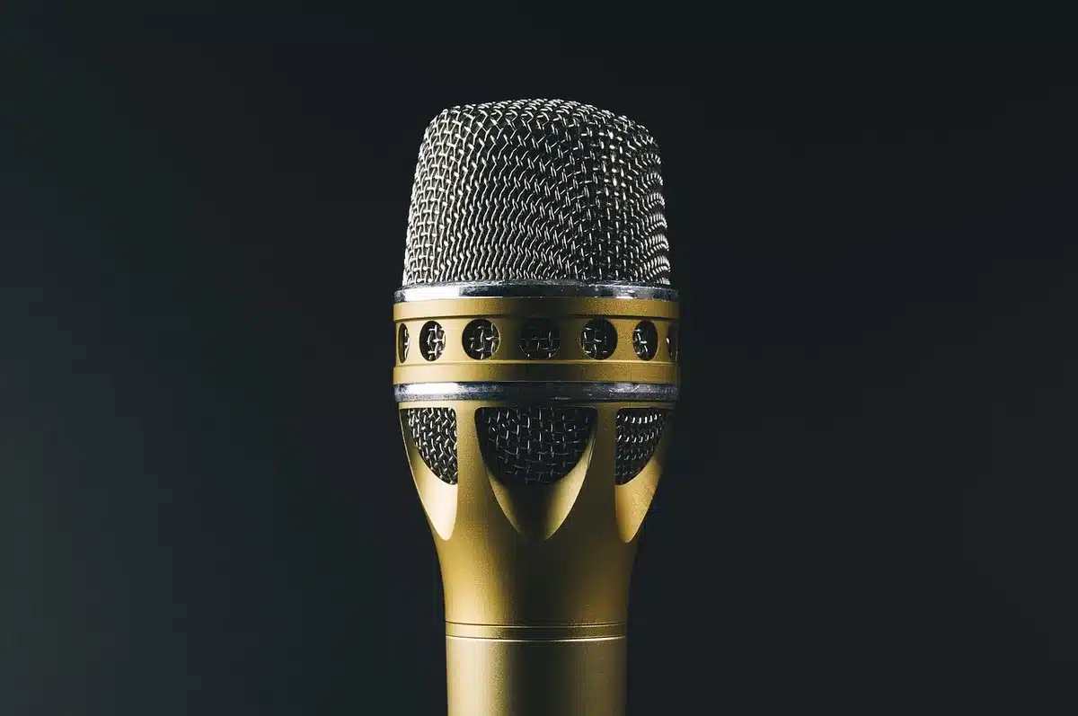 Vintage recording studio setup with microphone and mixing equipment