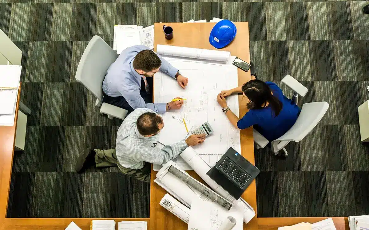 Professional in discussion about media strategy and public relations communication tactics