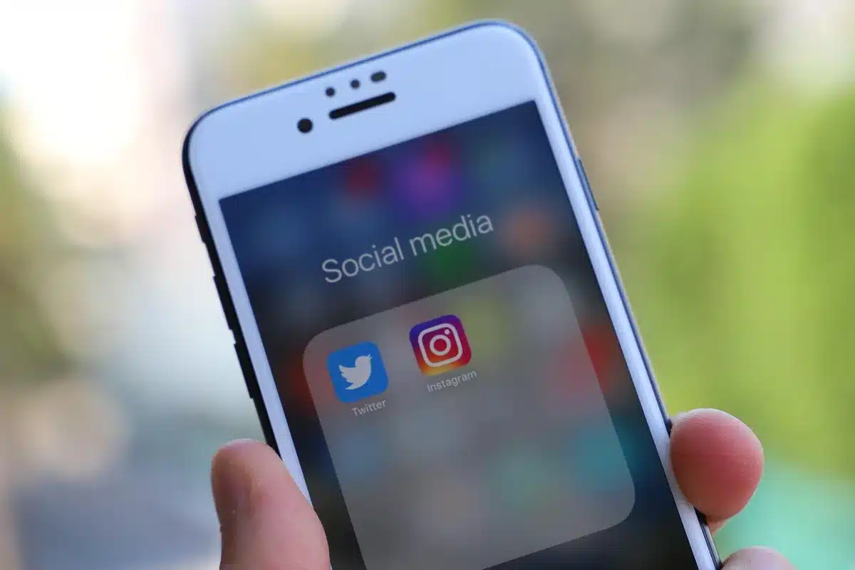 Smartphone screen with social media reactions and shares