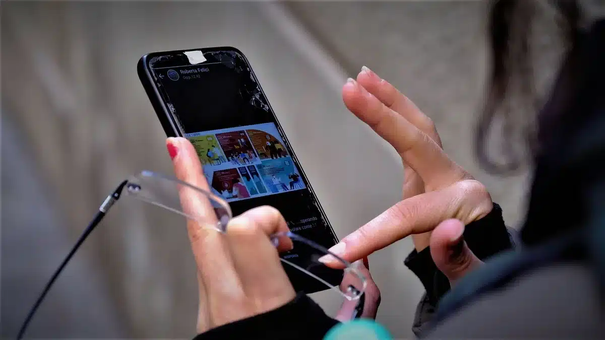 Smartphone on a table displaying a short video message