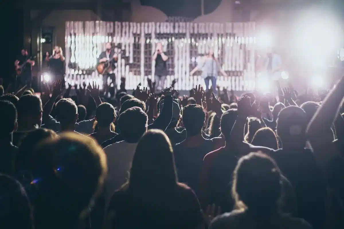 Stage with colorful immersive lighting and large visual screens