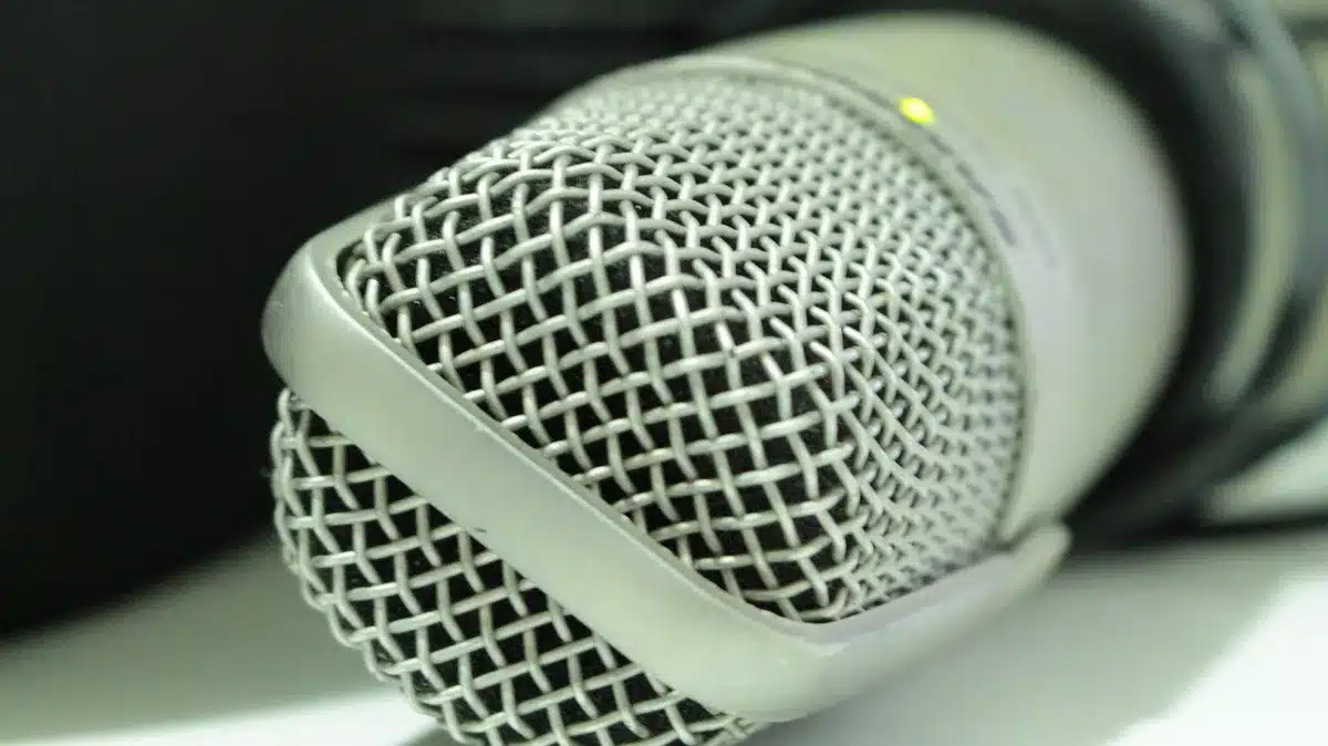Close-up of a radio studio booth interior suggesting game radio production