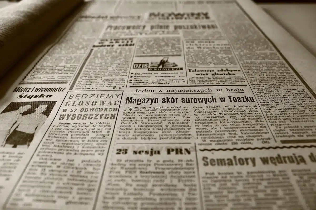 Courthouse foyer with legal files, a silhouette leaving and newspapers on a bench