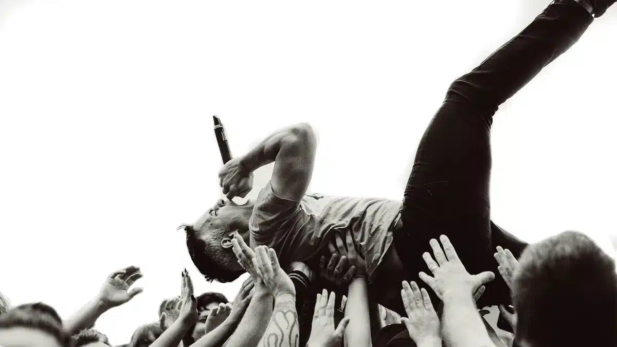 Fans arguing on social media with mixed reactions to a band's new direction
