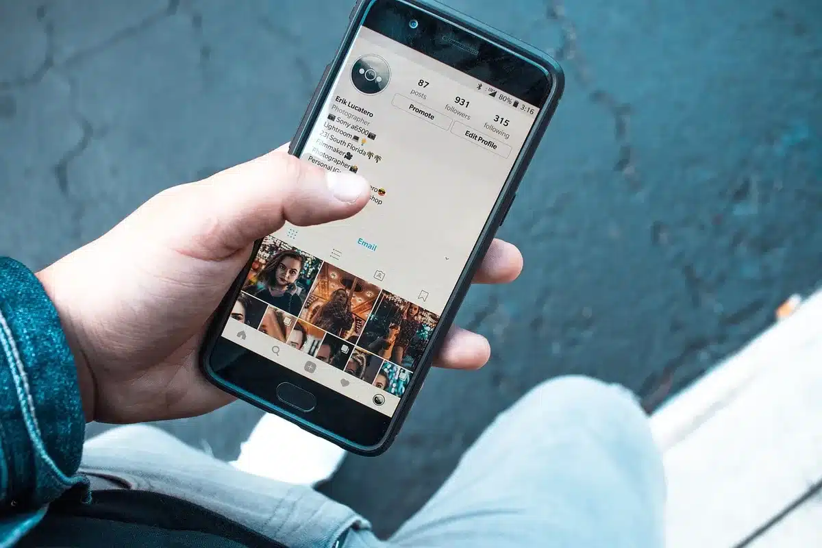 Close-up of smartphone showing memes and social reactions