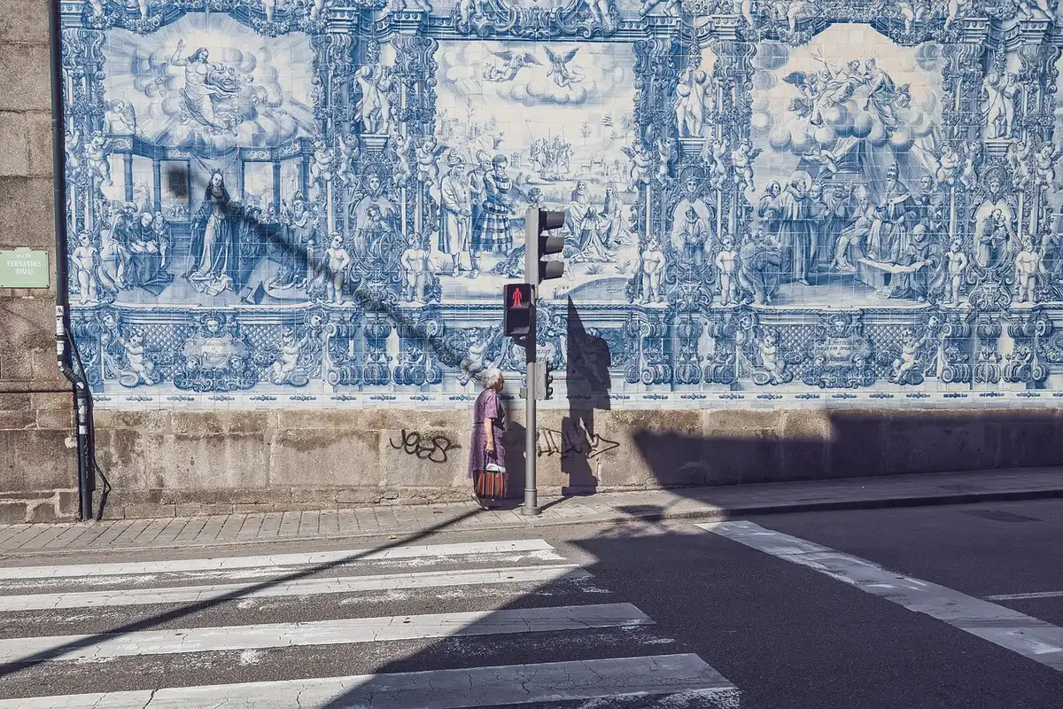 A colorful street mural honoring Tupac on an urban wall