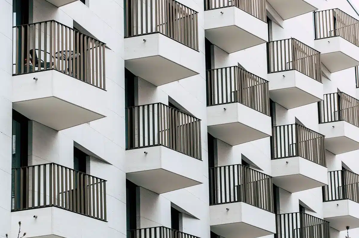 Young adults in an urban apartment setting, embodying millennial life and generational themes.