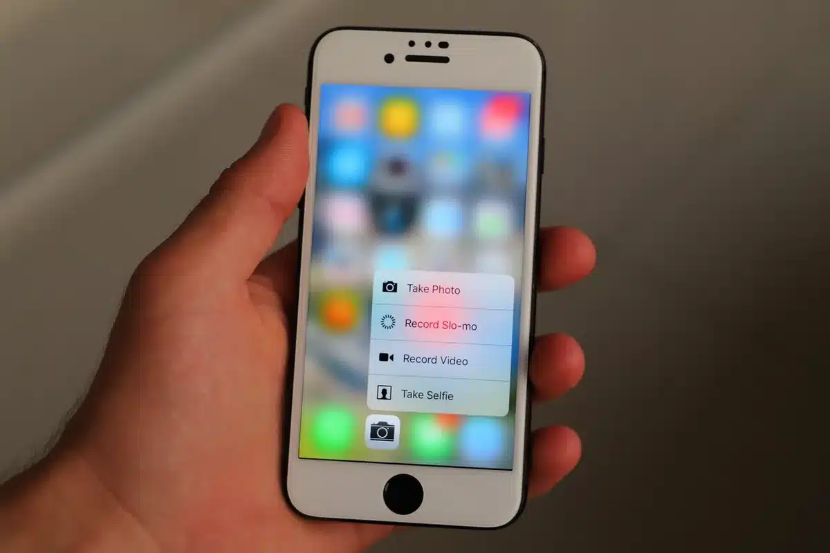 Fans reacting on social media shown on phones and laptops