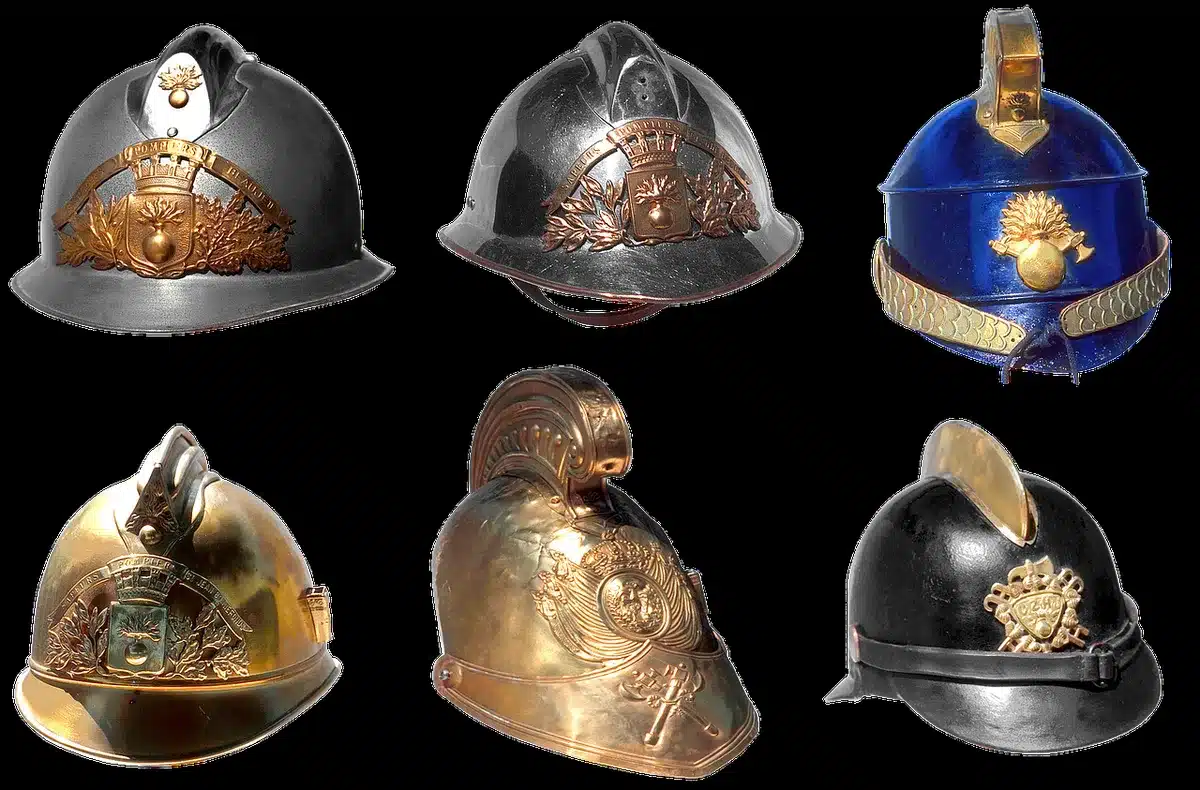 Firefighter helmet beside a hand-labeled cassette in a dim room