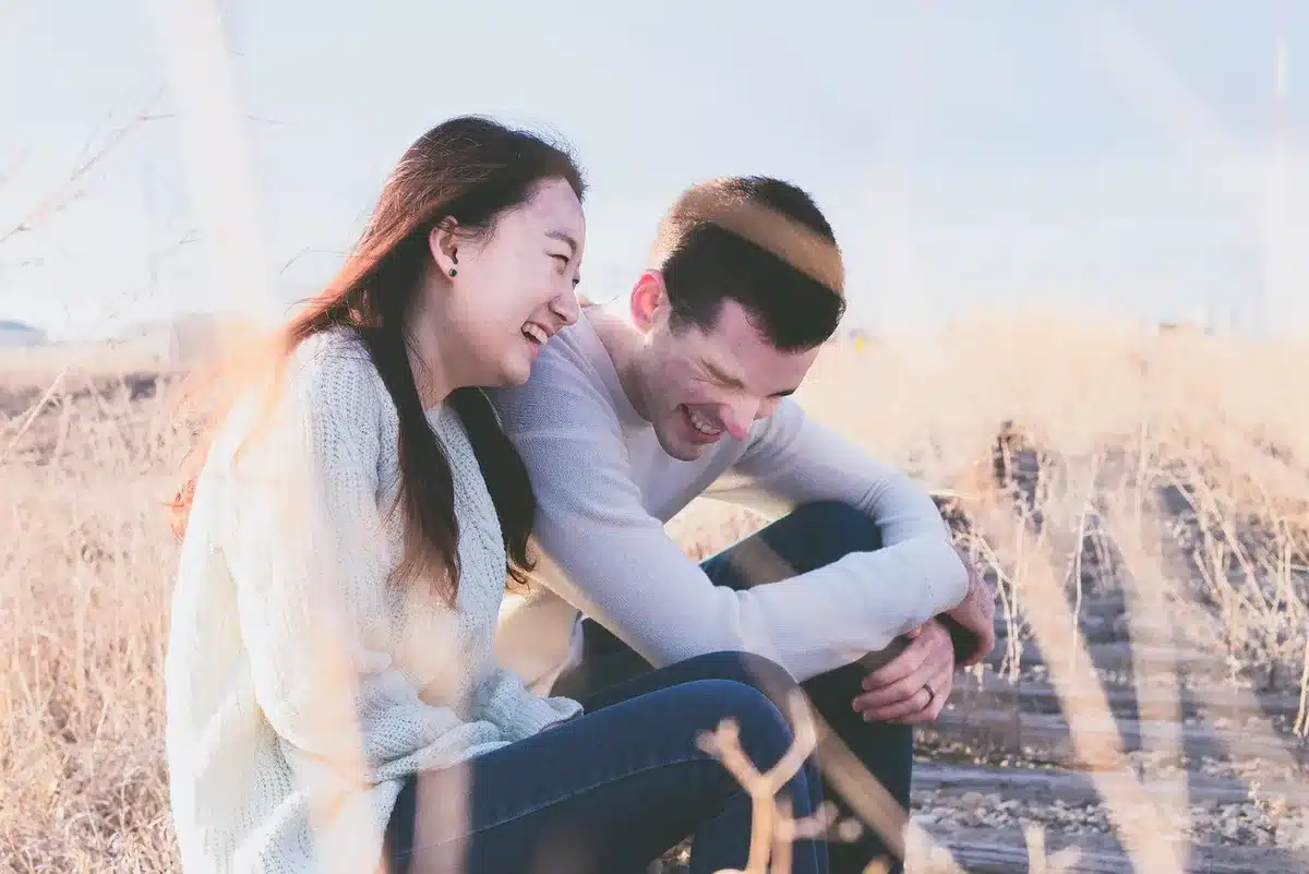 Musicians laughing together, bonding after a prank