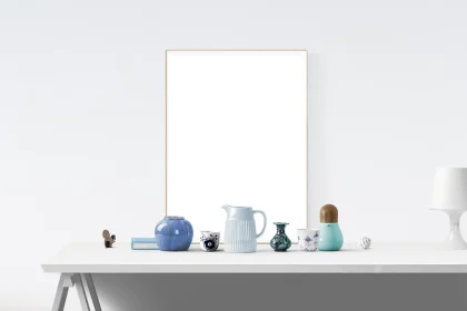 Hands arranging minimalist objects on a tidy tabletop to suggest optimization and curation