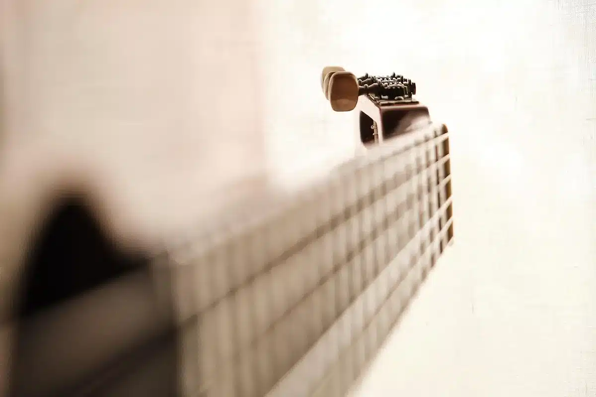 Close-up of a guitarist's pedalboard with delays and reverbs