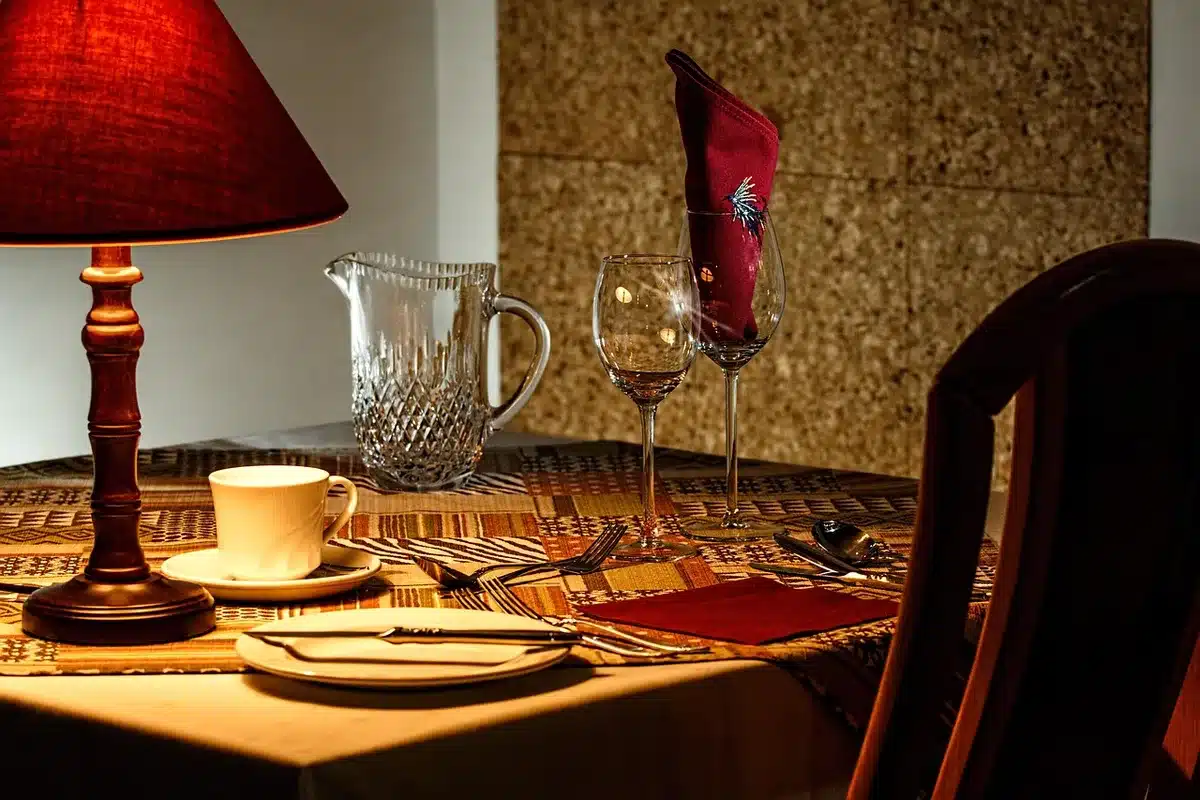 Couple at an intimate dinner listening to a slow piano ballad