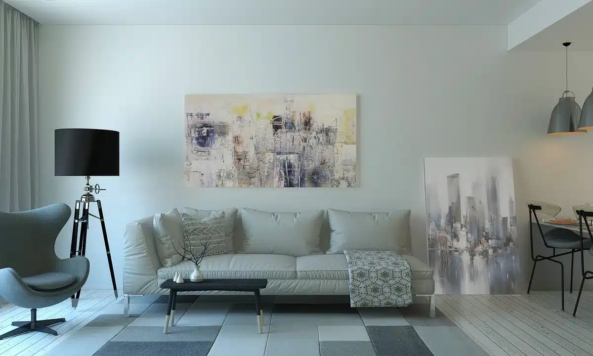 Person wearing headphones watching TV to illustrate spatial audio and Atmos