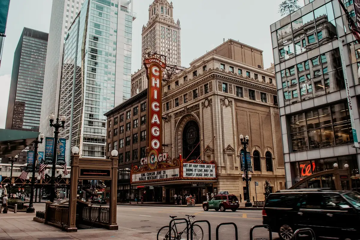 Chicago downtown skyline with iconic music venue architecture.