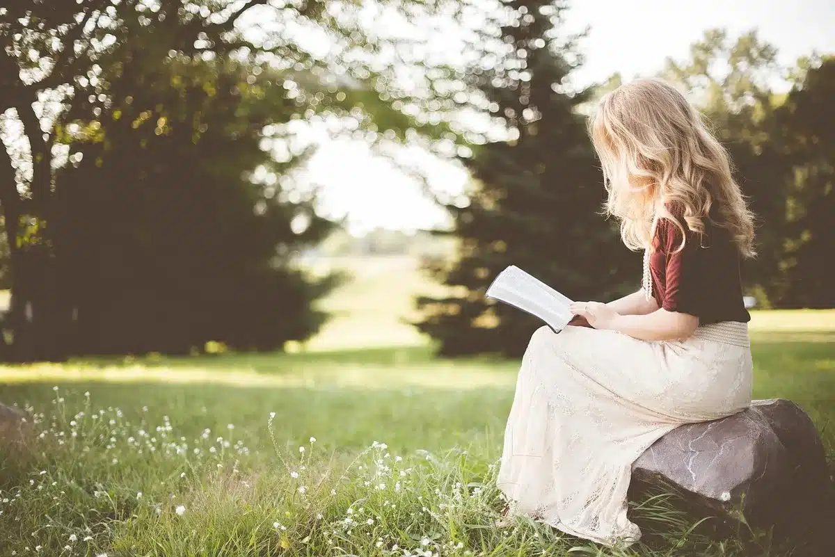 Teen girls with different styles reading together
