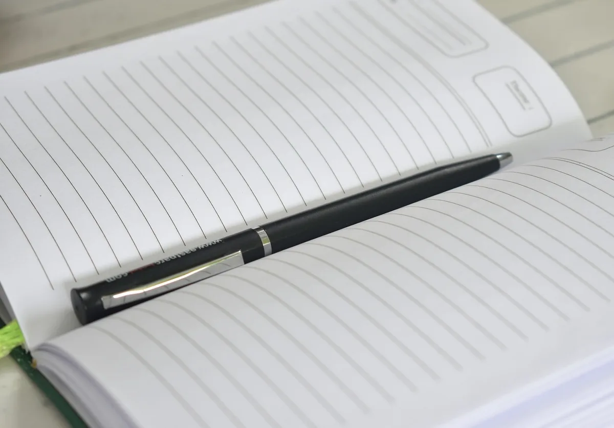 Medical documents and test results laid out on a desk for review