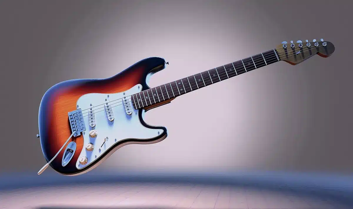 Electric guitar and amp showing crunchy distorted tones in a practice space
