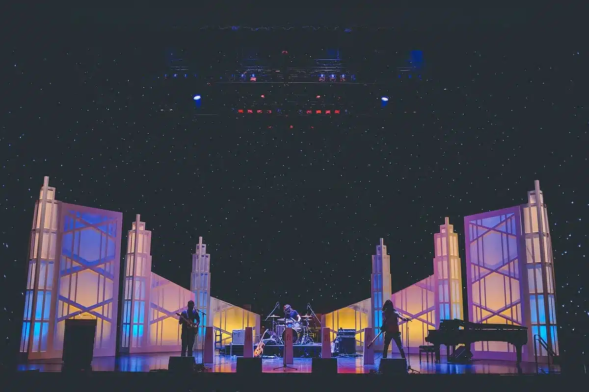 Band performing an intimate set under warm stage lights
