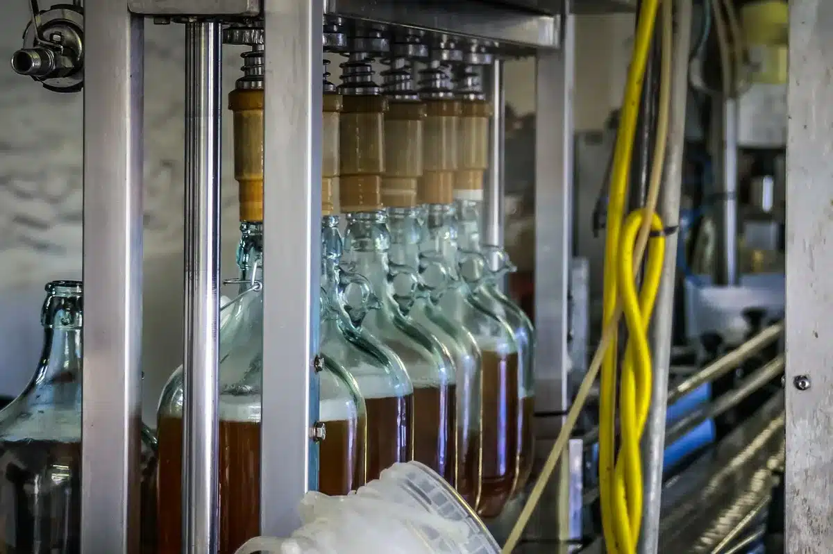 Industrial food processing line with workers and packaging