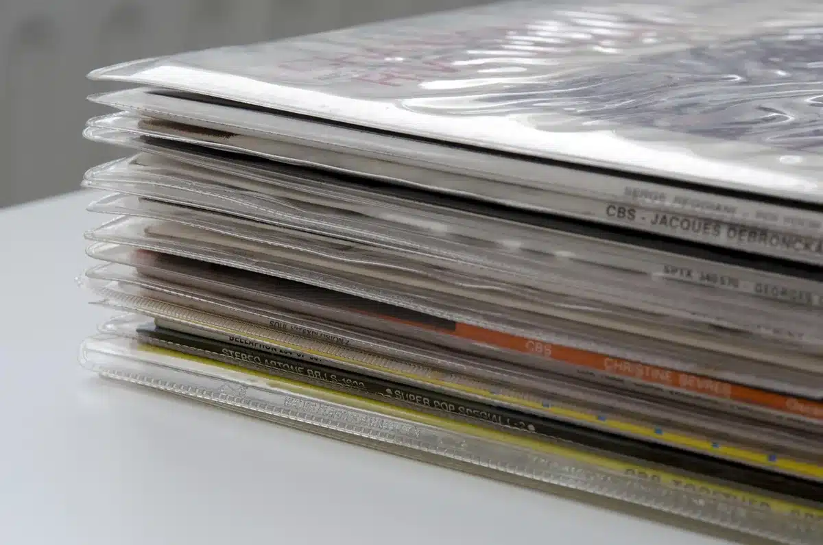 Stack of classic punk and post-punk vinyl records fanned out on a table
