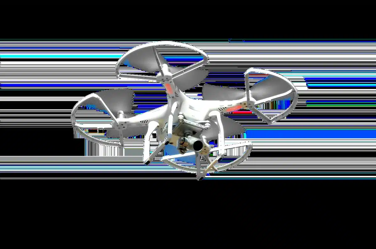 Carry case open with compact drone, batteries and accessories on a table