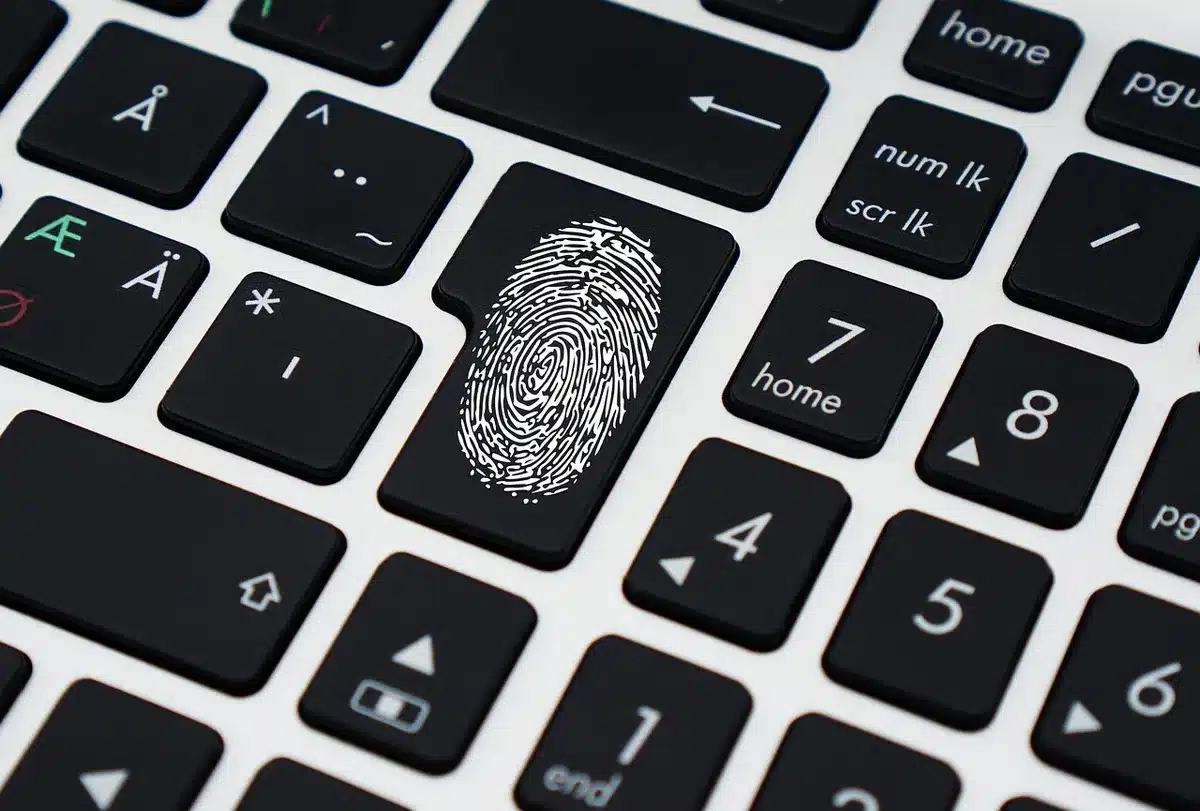 Person registering online for festival tickets on a laptop